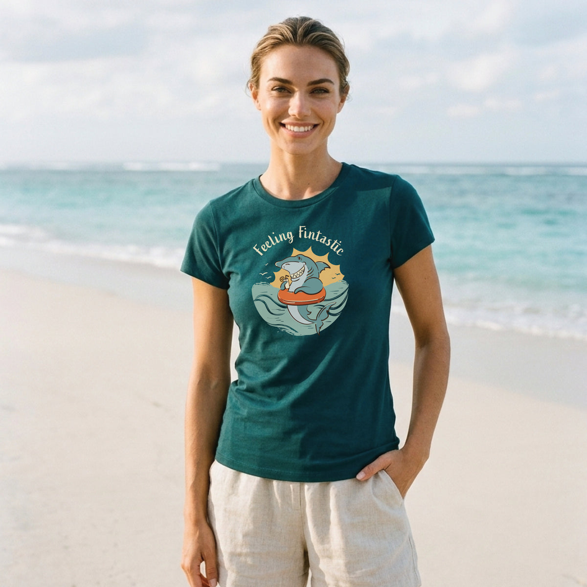 Woman wearing a Funny Shark T-Shirt featuring a hand-drawn Australian funny shark design and “Feeling Fintastic” slogan, styled in a casual outdoor lifestyle.