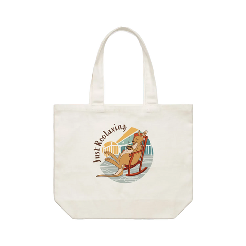 Funny kangaroo tote bag featuring a hand-drawn Australian kangaroo relaxing with a cup of tea on a cotton shoulder bag by Wooby.