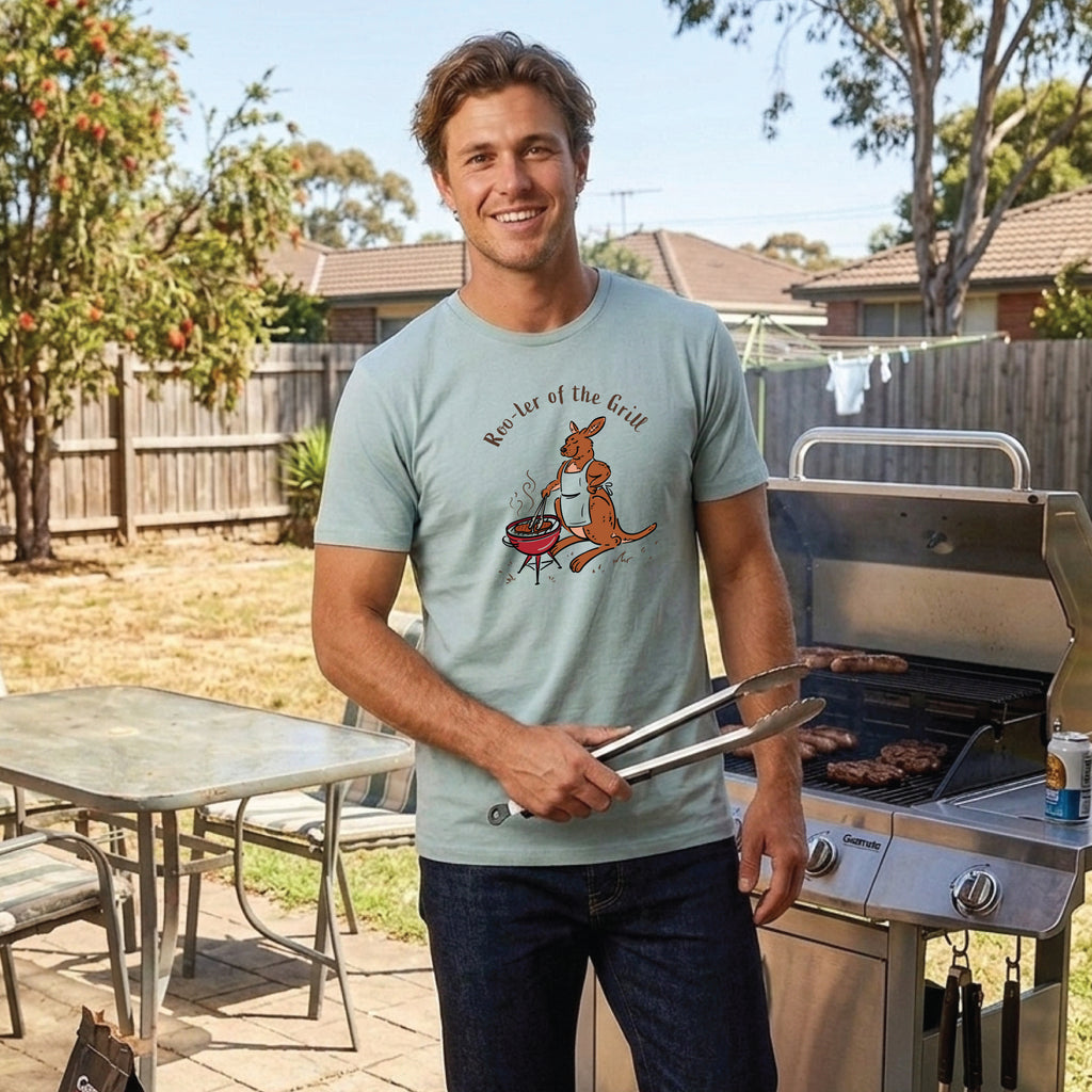 Man wearing a Roo-ler of the Grill kangaroo t-shirt featuring a hand-drawn kangaroo cooking at a BBQ, perfect for BBQ lovers and animal fans