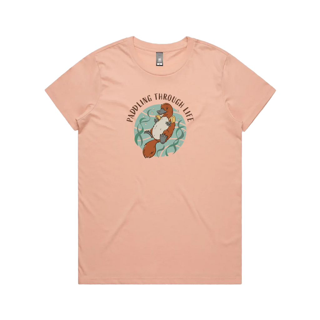 Funny women’s pale pink t-shirt with hand-drawn platypus design Paddling Through Life
