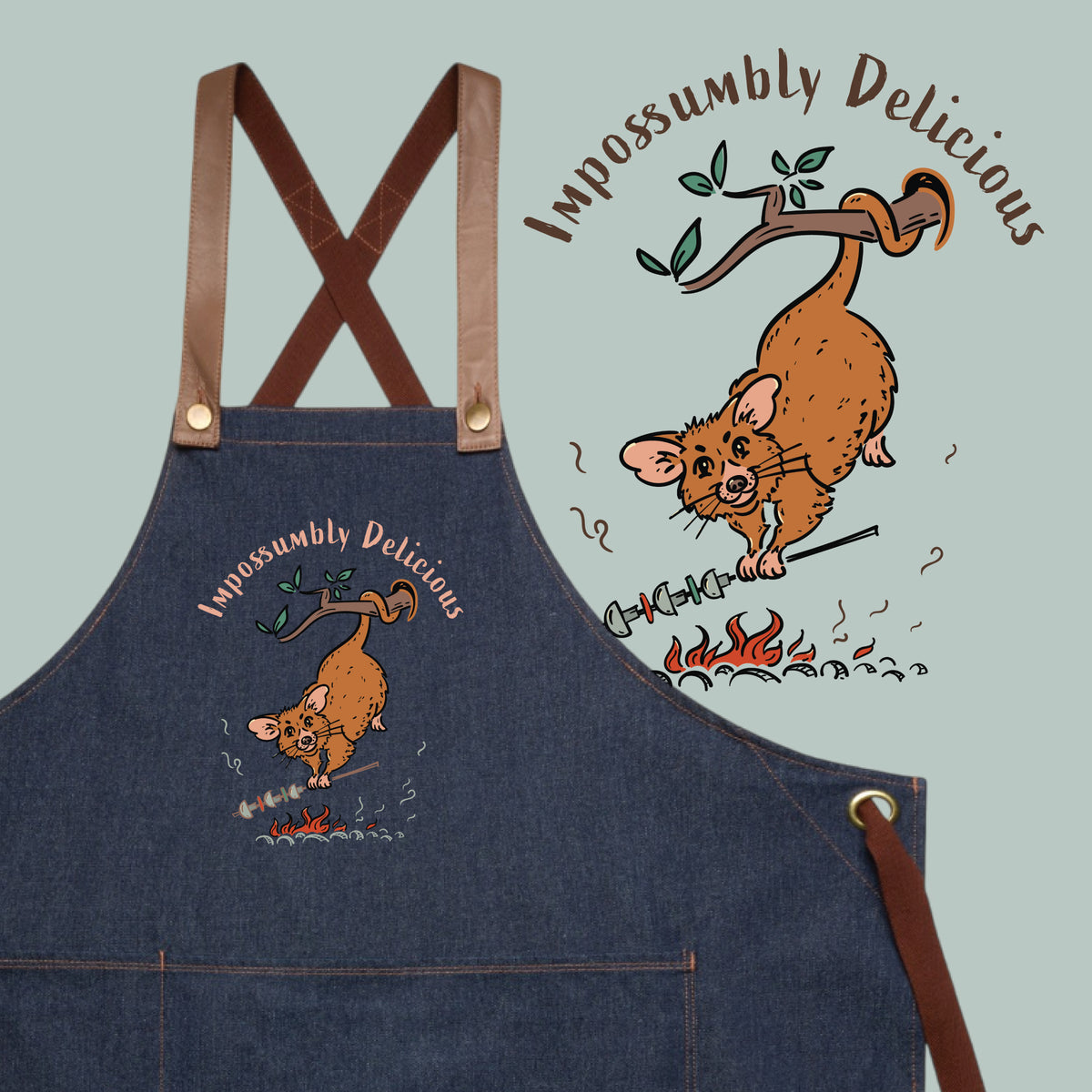 Possum BBQ denim apron featuring a hand-drawn possum cooking over an open fire with Impossumbly Delicious slogan