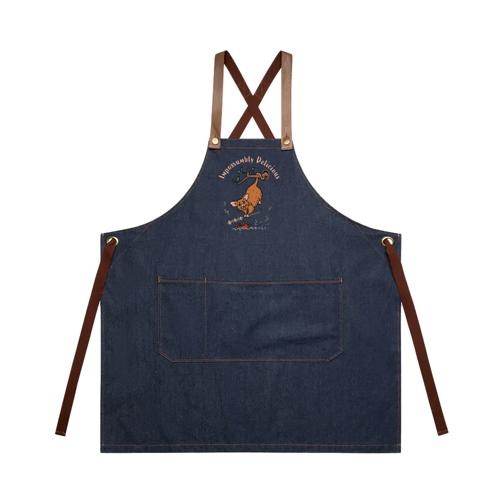 Possum BBQ denim apron featuring a hand-drawn possum cooking over an open fire with Impossumbly Delicious slogan
