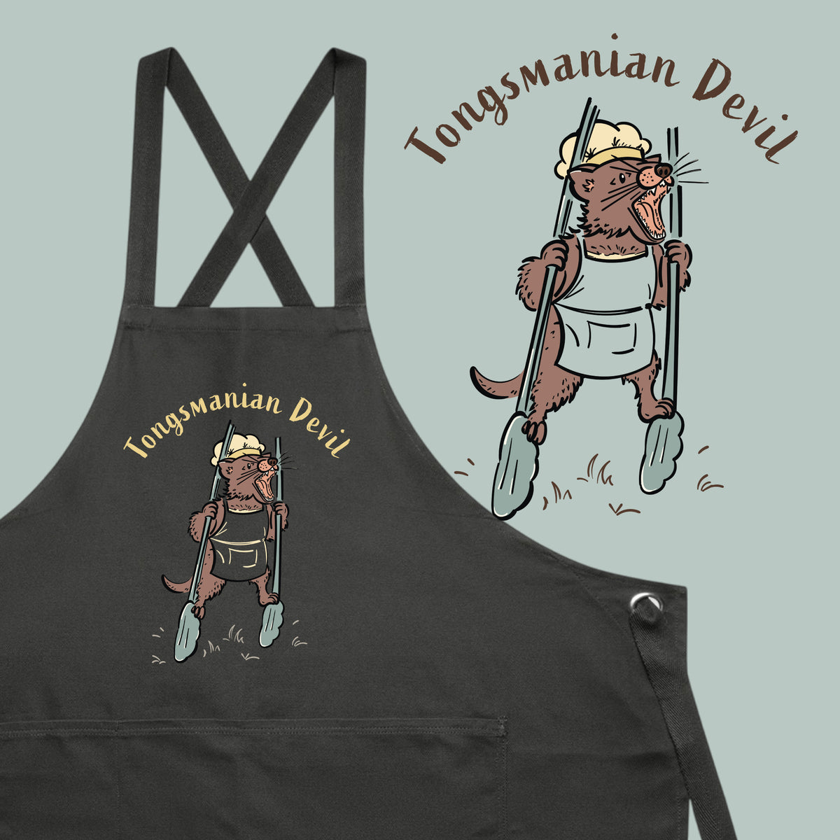 Tasmanian Devil BBQ cotton canvas apron featuring a hand-drawn Tassie devil holding cooking tongs with Tongsmanian Devil slogan