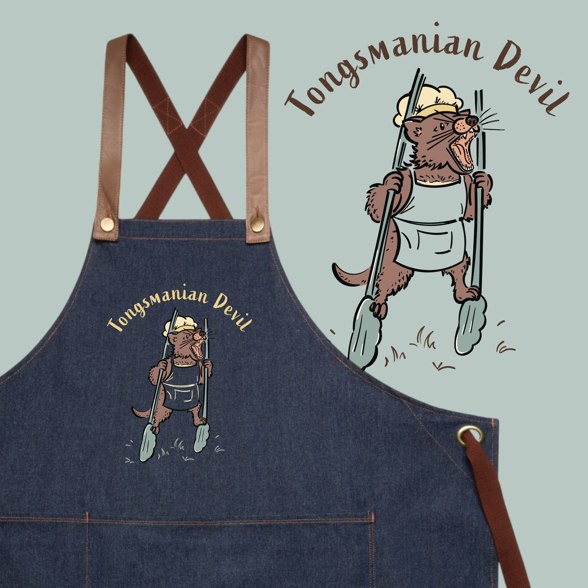 Tasmanian Devil BBQ denim apron featuring a hand-drawn Tassie devil holding cooking tongs with Tongsmanian Devil slogan