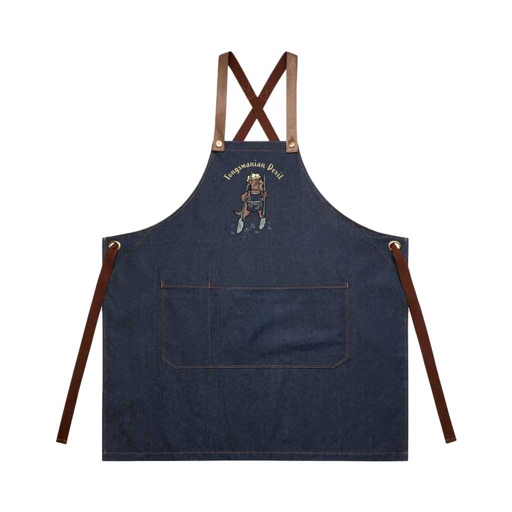 Tasmanian Devil BBQ denim apron featuring a hand-drawn Tassie devil holding cooking tongs with Tongsmanian Devil slogan