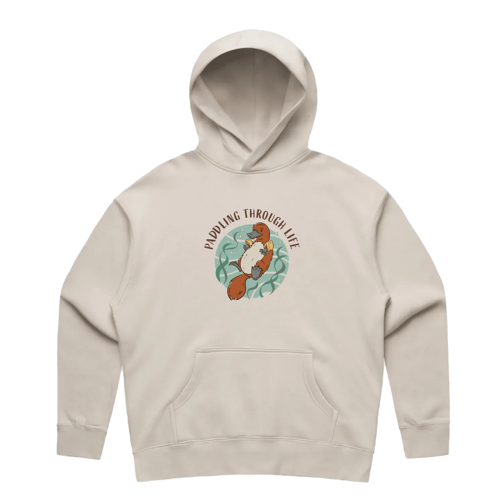Women’s bone platypus hoodie featuring a hand-drawn platypus floating with floaties, Paddling Through Life design
