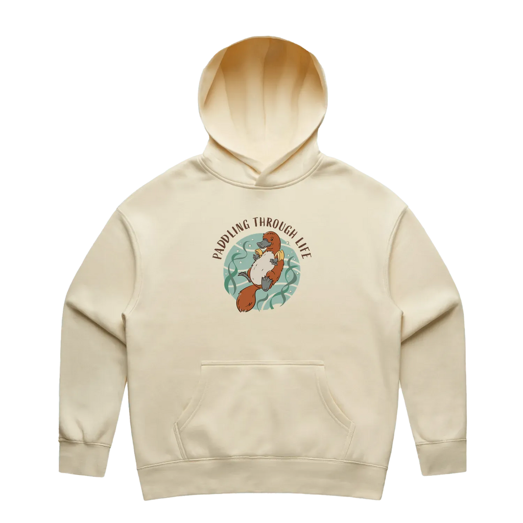 Women’s butter platypus hoodie featuring a hand-drawn platypus floating with floaties, Paddling Through Life design